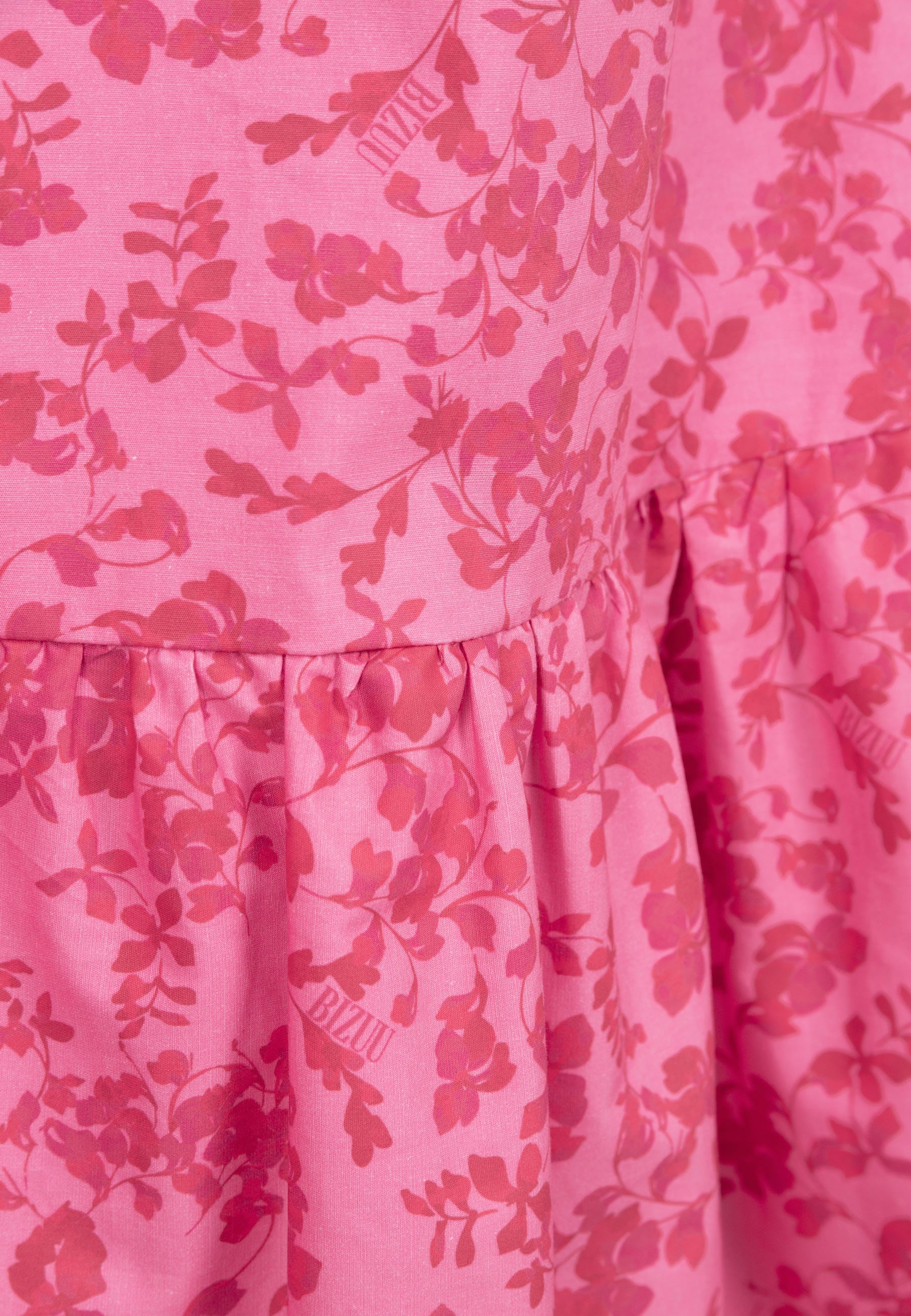 Różowa sukienka midi z autorskim printem LUMIA