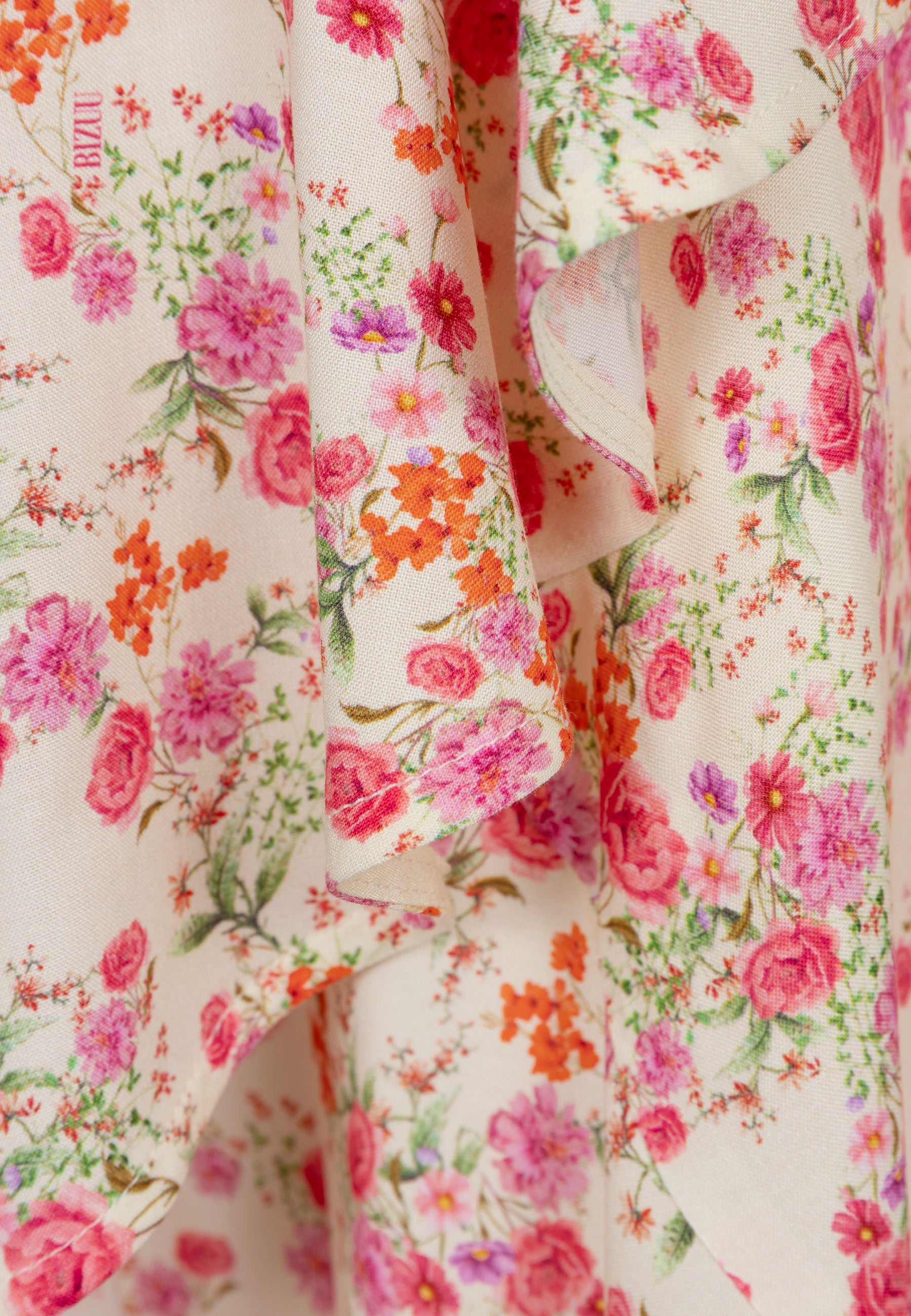 Kopertowa sukienka z ozdobną falbanką ISLAY multikolor